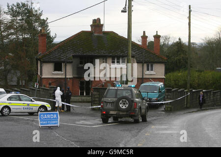 Two dead in house fire at Irish army camp. Garda at the scene of a fatal fire at the Curragh Camp in Kildare, where two people died. Stock Photo