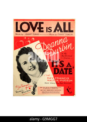 A sheet music cover for Love is All by Deanna Durbin. Stock Photo