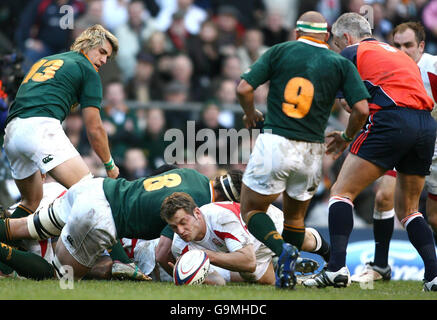 England's Mark Cueto scores his side's first try against South Africa during the International match at Twickenham, London. Stock Photo