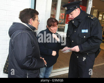 Gardai appealing for information on the streets of Finglas in Dublin as they step up their hunt for the killer of Lee Kinsella. Stock Photo