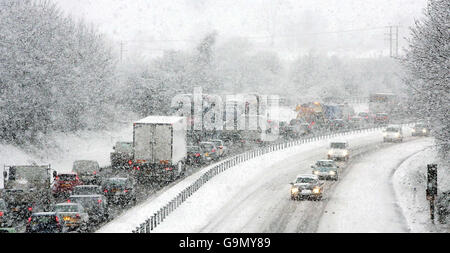 Traffic on the M80 road near Denny in Scotland after heavy snow fell. Stock Photo