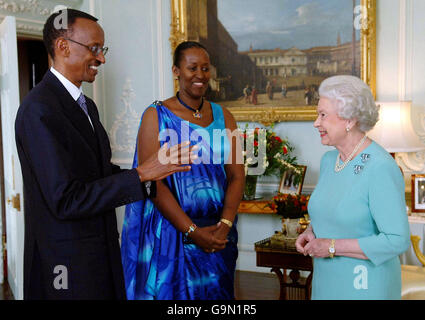 Britain's Queen Elizabeth II receives the President of Rwanda, Mr. Paul Kagame and his wife Jeannette at Buckingham Palace, London. Stock Photo