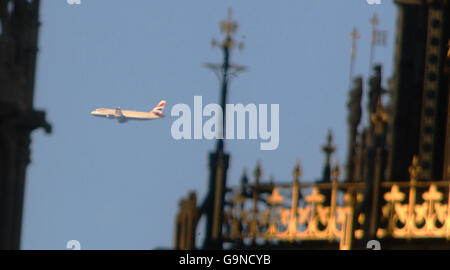 British Airways. A British Airways plane flies past Parliament in London to Heathrow airport. Stock Photo