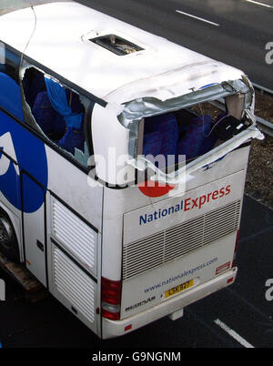 The National Express Coach pictured on the M40, that was involved in an accident on the slip road leading from junction 4B of the M4 east bound to the M25 junction 15 clockwise which resulted in the death of two people. PRESS ASSOCIATION Photo. Picture date: Thursday January 4, 2007. PRESS ASSOCIATION photo. Picture date: Thursday January 4, 2007. A further nine people have been seriously injured after the coach travelling from London to Aberdeen overturned at 11.45pm last night on the slip road leading from junction 4B of the M4 east bound to the M25 junction 15 clockwise. Stock Photo