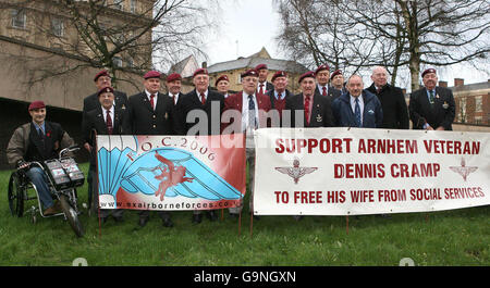 War Veterans show their support for Dennis Cramp (front, 4th from right) as he arrives at Blackburn County Court, where he is fighting for the right to look after his sick wife at home. Stock Photo