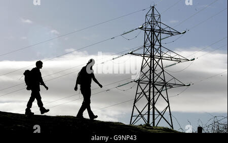 Hillwalkers at Sherrifmuir near Dunblane on the day the public inquiry begins for the proposed Beauly to Denny 400 kv Steel tower Double Circuit overhead electricity Transmission Line . Stock Photo