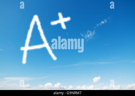 "A+" written in the blue sky Stock Photo