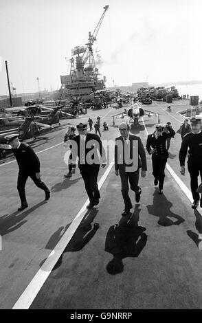 Defence Secretary John Nott and Captain Linley Middleton, captain of the Hermes, walking up the carrier's ski jump at Portsmouth. It is due to set sail for the Falklands. Stock Photo
