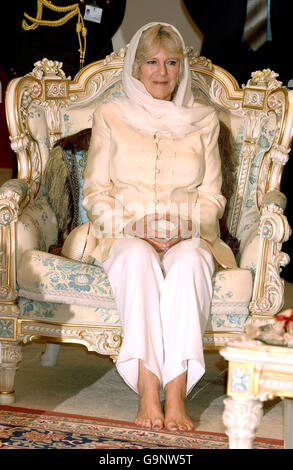 The Duchess of Cornwall takes a rest during a tour of the Grand Mosque in Kuwait City. Stock Photo