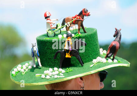 Woman wearing hat, Turf Stock Photo
