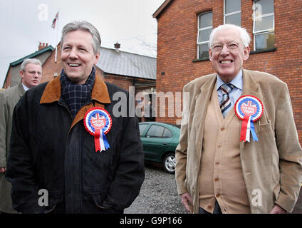 Leader of the Democratic Unionist Party Dr Ian Paisley with Peter Robinson at the launch of their party's Assembley Election Poster slogan, 'Getting it Right' in Belfast. Stock Photo