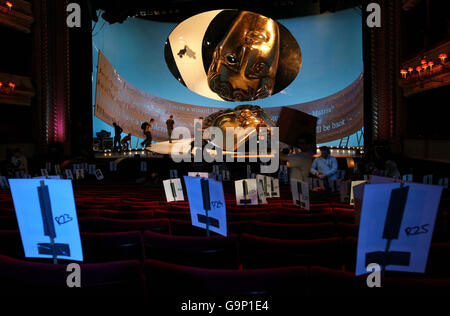 Final preparations are made on the eve of the BAFTA Film Awards at The Royal Opera House in central London. Stock Photo