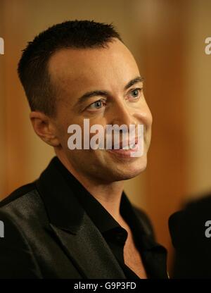 Designer Julien Macdonald backstage prior to his show at the London Hilton on Park Lane hotel, London. Stock Photo