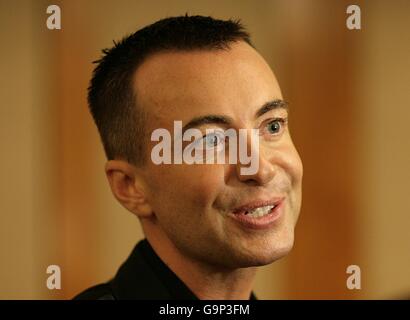 Designer Julien Macdonald backstage prior to his show at the London Hilton on Park Lane hotel, London. Stock Photo