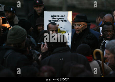 Director of Equalities & Policing for the Greater London Authority Lee Jasper (centre right) speaks before a march from Peckham Square in Peckham, south-east London, to Windrush Square in Brixton, south London. Stock Photo