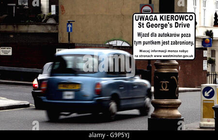 A Polish sign on a lamp post in St George's Drive, London, near the entrance to Victoria bus station. Stock Photo