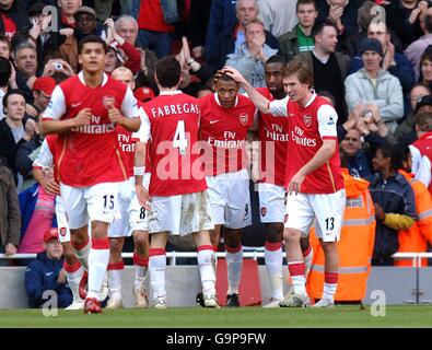 Soccer - FA Barclays Premiership - Arsenal v Reading - Emirates Stadium. Arsenal's Cesar Julio Baptista celebrates with teammates after scoring the second goal Stock Photo