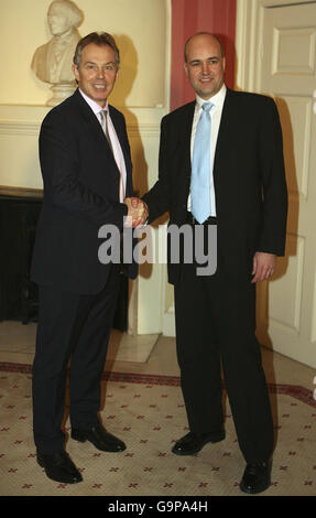 Britain's Prime Minister Tony Blair (left) meets with Swedish Prime Minister Fredrik Reinfeldt at 10 Downing Street in London. Stock Photo