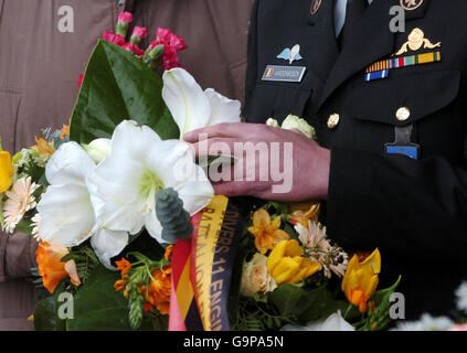 Belgian Engineer Diver Jan Vandenbosch holds flowers at a service, held at the British and International Sailors' Society centre in Dover, Kent, commemorating the 20th anniversary of the Zeebrugge ferry disaster. Stock Photo