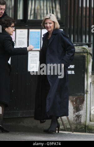 Beverley Charman, whose ex-husband John Charman is today trying to claw back from his former wife more than half the biggest divorce award in British legal history, leaves the High Court in London with an unidentified man. Stock Photo