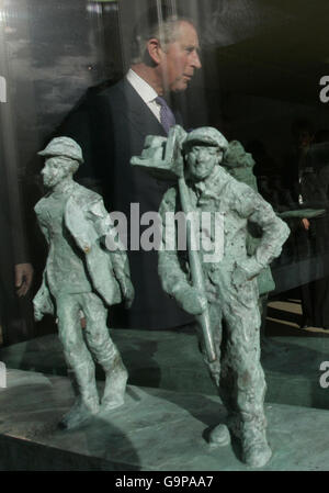 Britain's Prince Charles, top center, walks past an exhibit during the opening ceremony for the Clore Learning Centre at Hampton Court Palace, Middlesex. Stock Photo