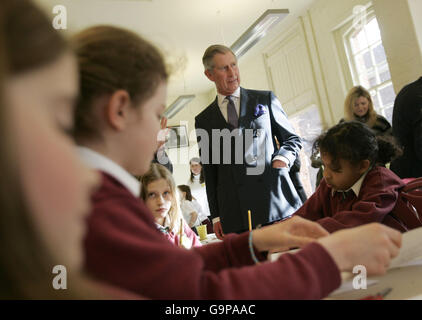 Britain's Prince Charles speaks to school children at the opening ceremony for the Clore Learning Centre at Hampton Court Palace, Middlesex.