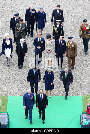 The Prince of Wales, French President Francois Hollande, Prime Minister David Cameron, the Duchess of Cornwall, the Duke and Duchess of Cambridge and Prince Harry amongst VIPs at a service to mark the 100th anniversary of the start of the battle of the Somme at the Commonwealth War Graves Commission Memorial in Thiepval, France, where 70,000 British and Commonwealth soldiers with no known grave are commemorated. Stock Photo