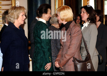 The Duchess of Cornwall (l) and the Princess Royal (centre) at a Women in Business Reception at Buckingham Palace today, Valentine's Day. Stock Photo