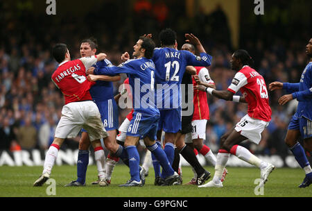 Soccer - Carling Cup - Final - Chelsea v Arsenal - Millennium Stadium. Arsenal and Chelsea players get involved in a tussle during the Carling Cup Final at Millennium Stadium, Cardiff. Stock Photo