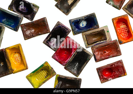 Old oil paints in tubes scattered on white background Stock Photo