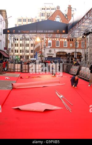 A view of the red carpet being laid ahead of the 2007 Orange British Academy Film Awards (BAFTAs) at the Royal Opera House in Covent Garden, central London. Stock Photo
