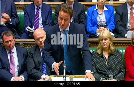 Conservative party leader David Cameron responds after Britain's Prime Minister Tony Blair announced the first large-scale British troop withdrawal from Iraq, in the House of Commons, London. Stock Photo