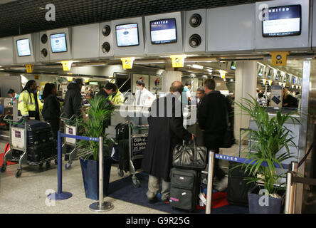 Generic transport pics. Passengers check-in at Terminal Three of London's Heathrow Airport. Stock Photo