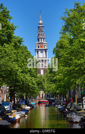 Tower of the Zuiderkerk, southern church, and the Groenburgwal canal in Amsterdam, Holland Stock Photo