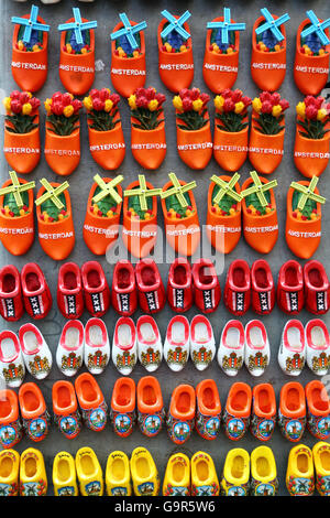 Wooden clogs fridge magnets on sale in the flower market in Amsterdam, Holland Stock Photo