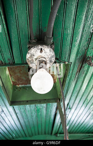 Light fixture wired on the ceiling of train Stock Photo