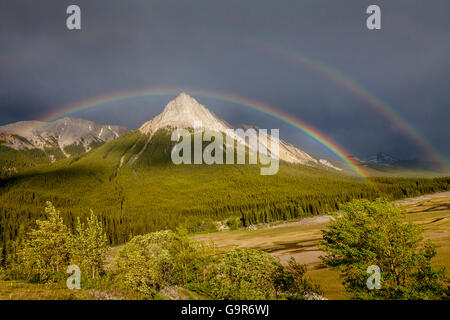 Double rainbow over the peak in Rocky Mountains, Canadian Rockies, Canada, North America Stock Photo