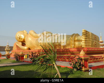 Lying buddha at golden Stupa at Pha That Luang, Vientiane, province Vientiane, Laos, Asia / Vientiane Stock Photo