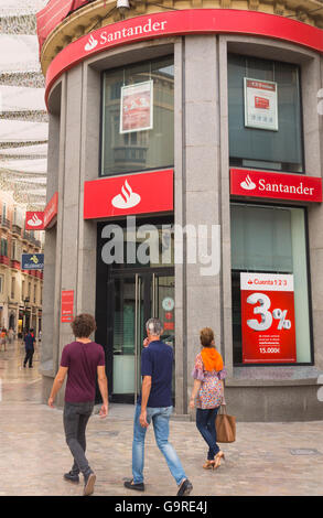 Malaga, Costa del Sol, Malaga Province, Andalusia, southern Spain.  Branch of Banco Santander in Calle Larios. Stock Photo