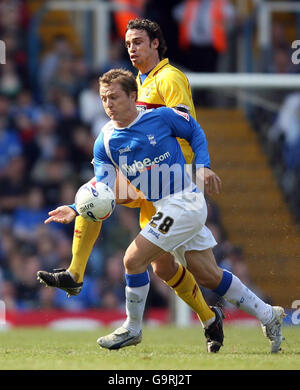 Soccer - Coca-Cola Football Championship - Birmingham City v Burnley - St Andrews. Birmingham City's Gary McShreffrey and Burnley's Michael Duff during the Coca-Cola Football Championship match at St Andrews, Birmingham. Stock Photo