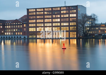Berlin, Germany. January 15, 2014. Business Buildings located at Berlins River Spree. Longtime Exposure, HDR Look. Stock Photo