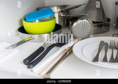 the Various tableware on shelf in the kitchen Stock Photo