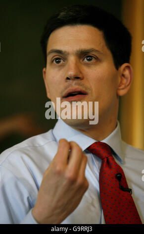 Britain's Environment Minister David Miliband speaks during a meeting to outline the Government's blueprint for tackling climate change. Stock Photo