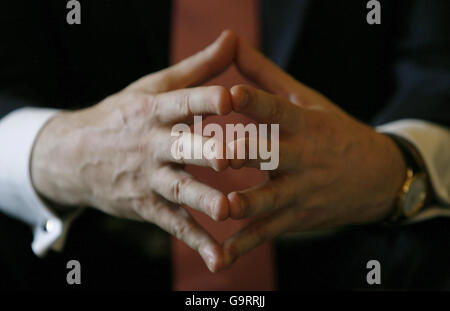 The hands of Britain's Chancellor Gordon Brown are seen during a meeting to outline the Government's blueprint for tackling climate change. Stock Photo