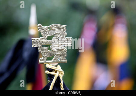 The top of a flag is seen as the coffin of private Jonathan Dany Wysoczan leaves St Lawrence's Church, Stoke-on-Trent. Stock Photo