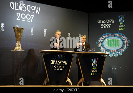 Scottish FA Chief Executive David Taylor (soon to be the new UEFA Chief Executive) with ex player Billy McNeill during the UEFA Cup Handover and Final Phase Draw held at the historic Old Fruitmarket at the City Halls in Glasgow Stock Photo