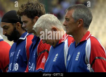 England's (left to right) Monty Panesar, James Anderson, coach Duncan Fletcher and operations manager Phil Neale during the minutes silence in memory of Pakistan coach Bob Woolmer during the ICC Cricket World Cup 2007 match at the Beausejour Stadium, Gros Islet, St Lucia. Stock Photo