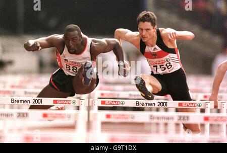 Athletics - Spar European Cup - Bremen. L-R; Tony Jarrett loses out to Germany's Florian Schwarthoff in the race for second place in the men's 110m hurdles Stock Photo