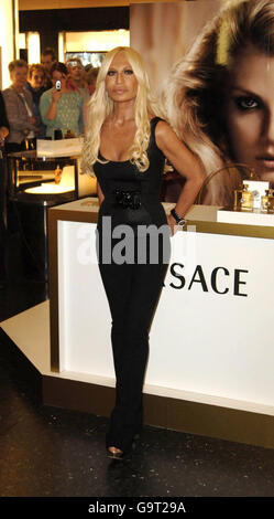 Donatella Versace promoted the new Versace fragrance Chrystal Noir which  has gone on sale exclusively at Harrods. The photocall took place at the  famous London store Stock Photo - Alamy