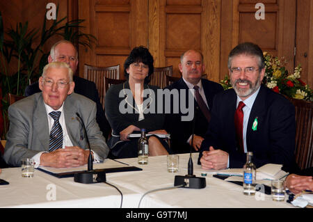 Democratic Unionist Party leader The Reverend Ian Paisley (left) and Sinn Fein President Gerry Adams speak to the media during a press conference at the Stormont Assembly building in Belfast. Stock Photo